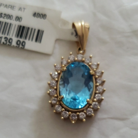 Classic Blue Topaz and 14k Gold pendant with Halo Design - Picture 3 of 4